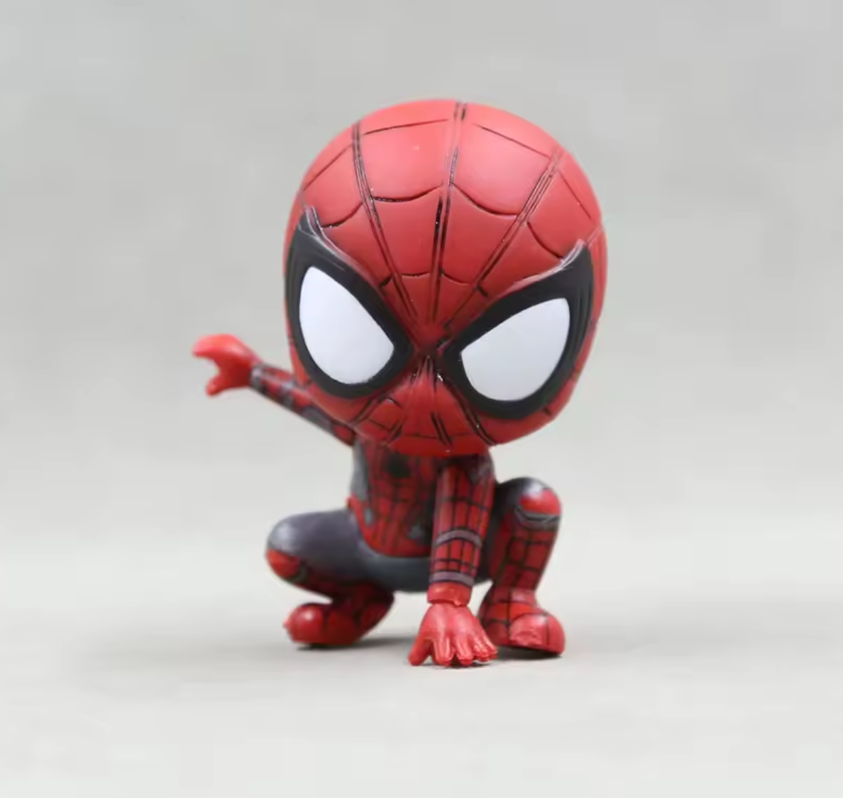 Classic red spider-themed miniature figure